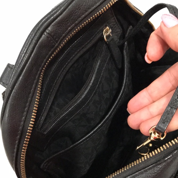 Michael Kors backpac with multiple pockets. Outside has some stains as pictured - Picture 9 of 15